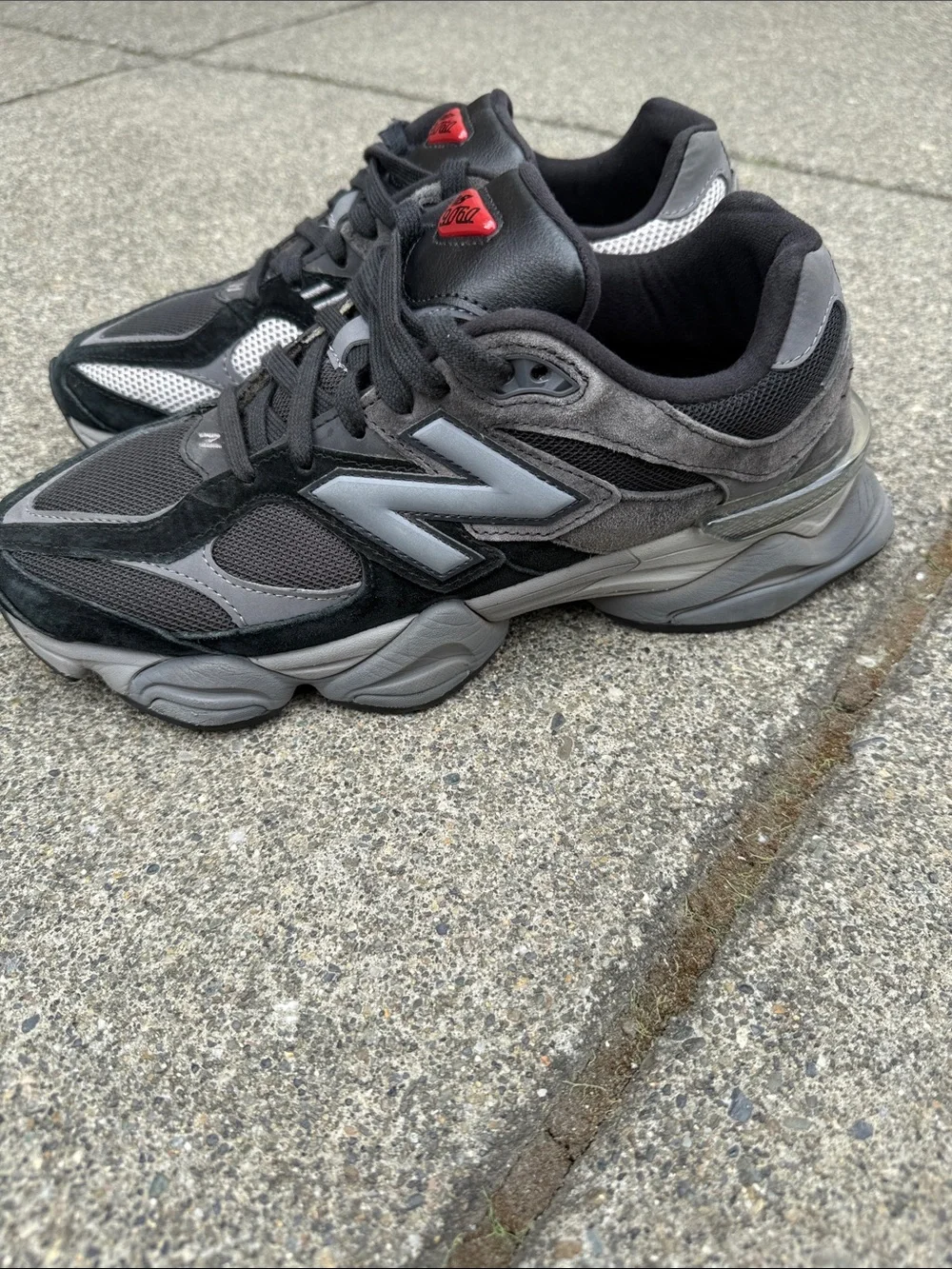 New Balance Black and Gray Men's Athletic Sneakers with Red Tongue Accents